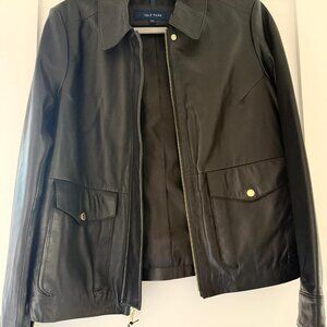 Black leather jacket with tags
